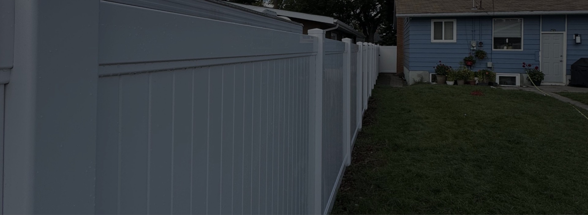 Fences near blue house 1