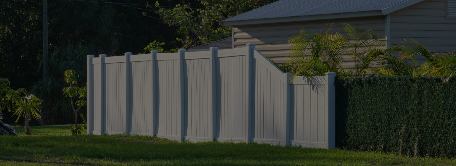 White fences outside home