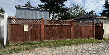Old fence in front of house